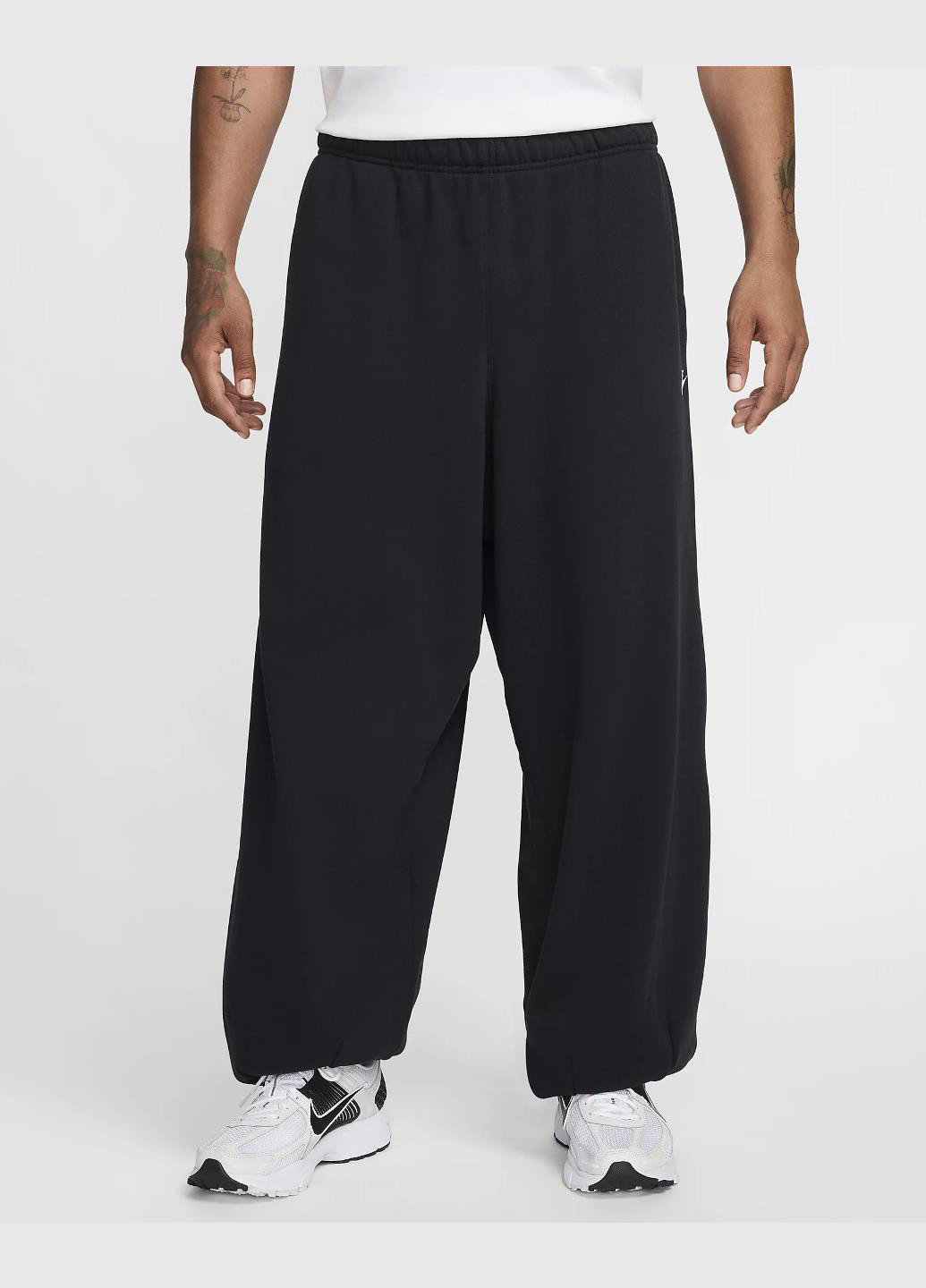 Черные спортивные демисезонные брюки Nike