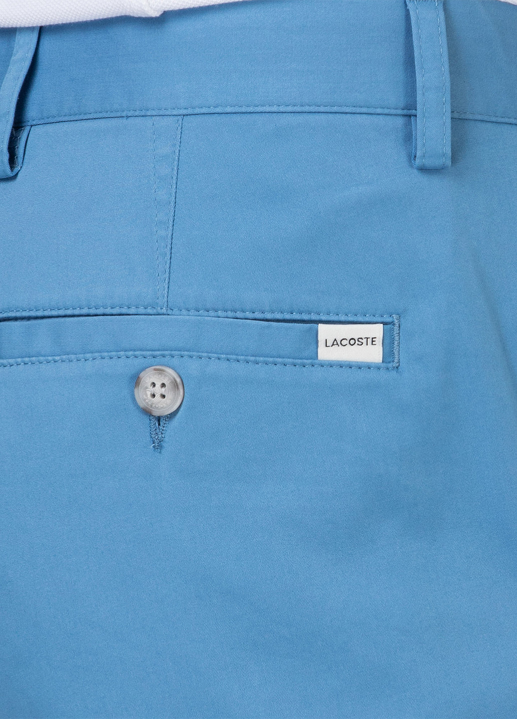 Синие кэжуал демисезонные чиносы брюки Lacoste
