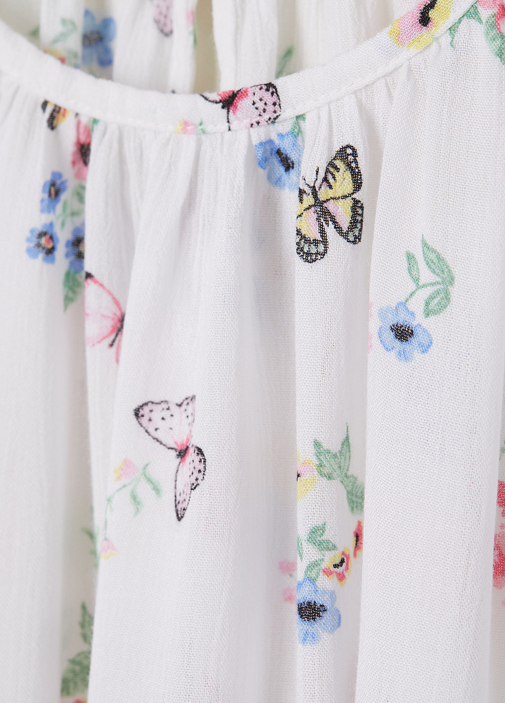 Белая цветочной расцветки блузка с коротким рукавом H&M летняя