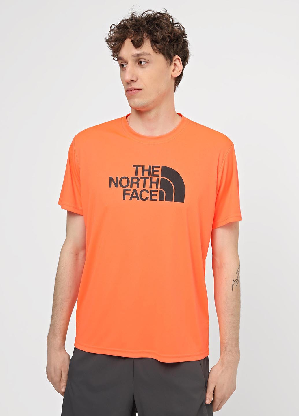 Помаранчева футболка The North Face
