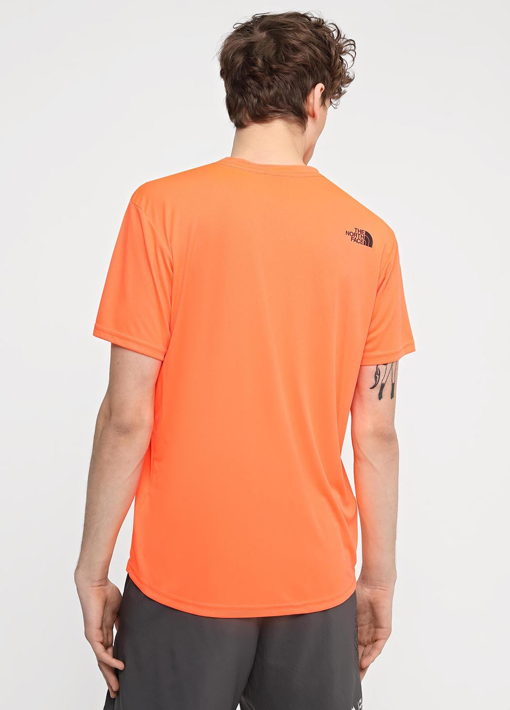 Помаранчева футболка The North Face