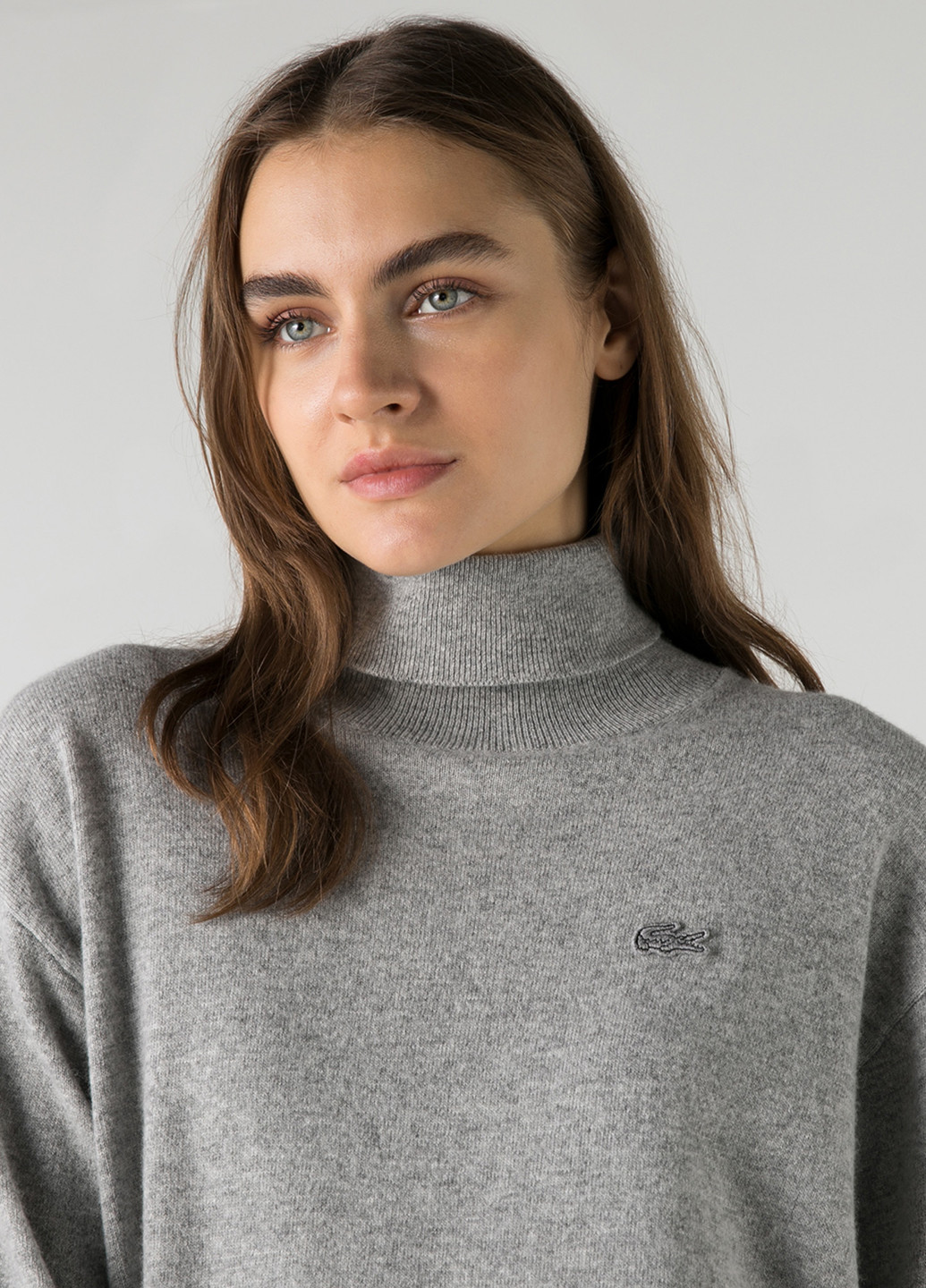 Серый демисезонный свитер Lacoste
