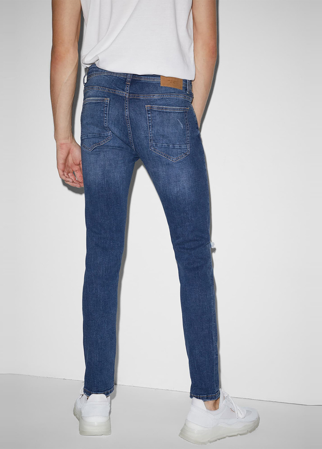 Синие демисезонные зауженные джинсы C&A