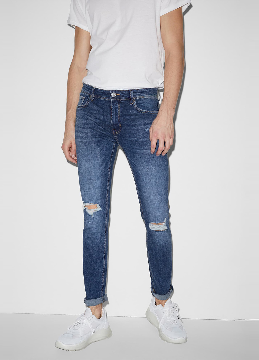 Синие демисезонные зауженные джинсы C&A