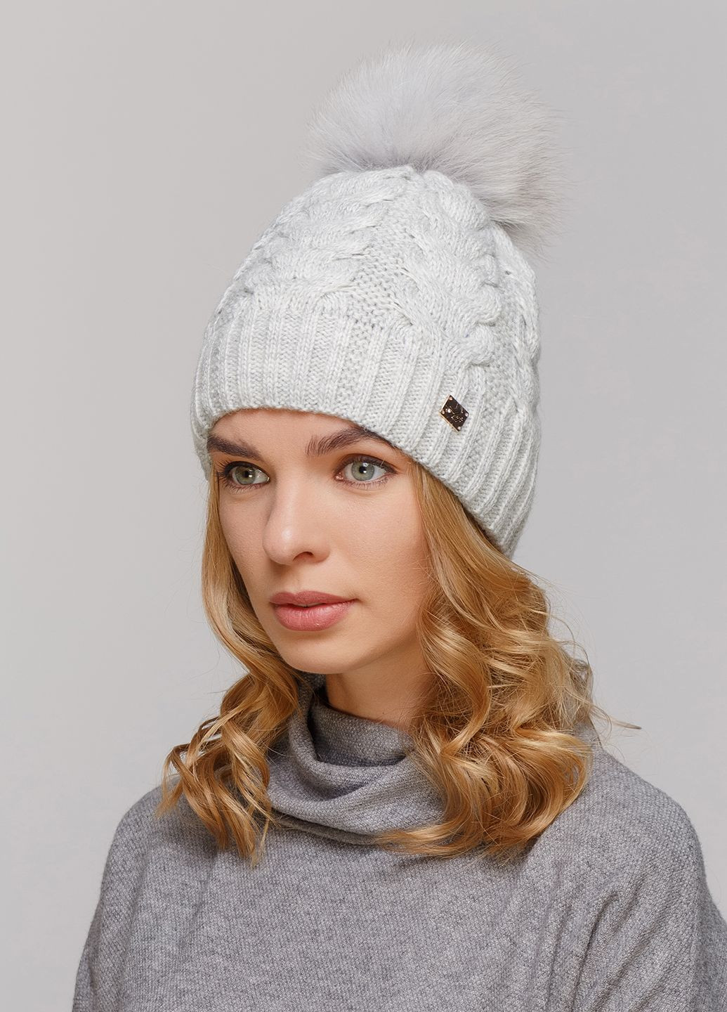 Зимняя теплая женская шапка на флисовой подкладке 550585 Merlini (249642850)