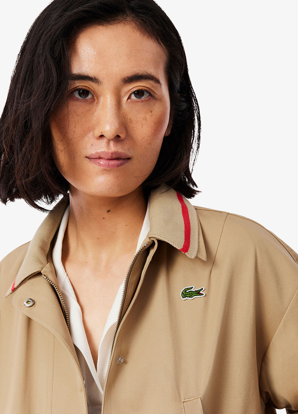 Бежевая демисезонная куртка Lacoste