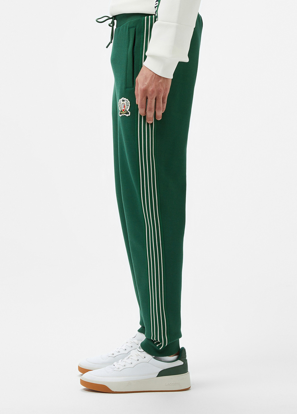Зеленые спортивные демисезонные джоггеры брюки Lacoste