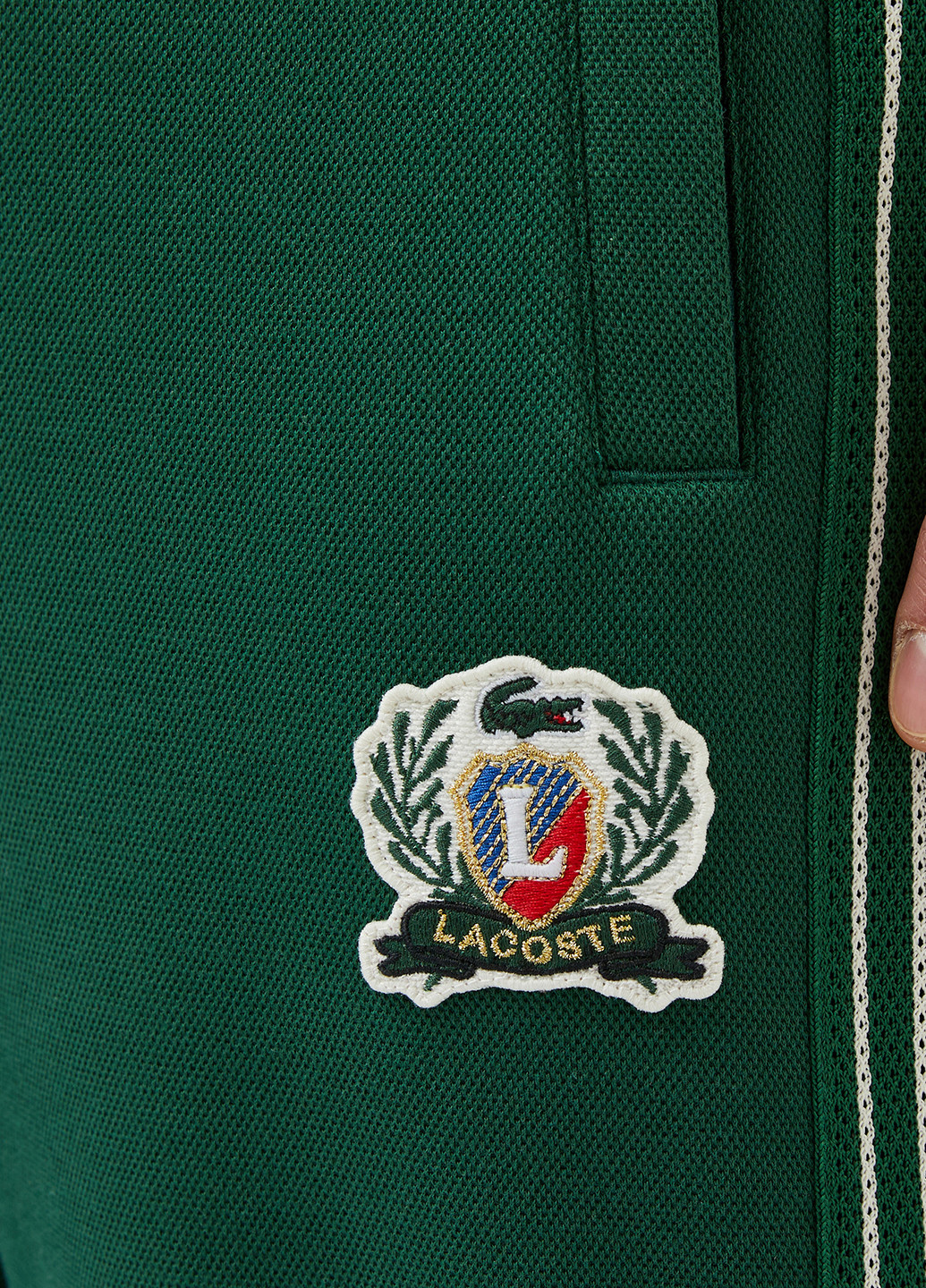 Зеленые спортивные демисезонные джоггеры брюки Lacoste