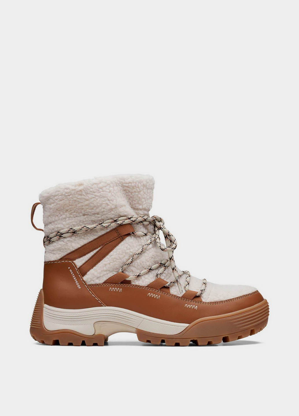 Бежевые дутики Clarks со шнурками с мехом