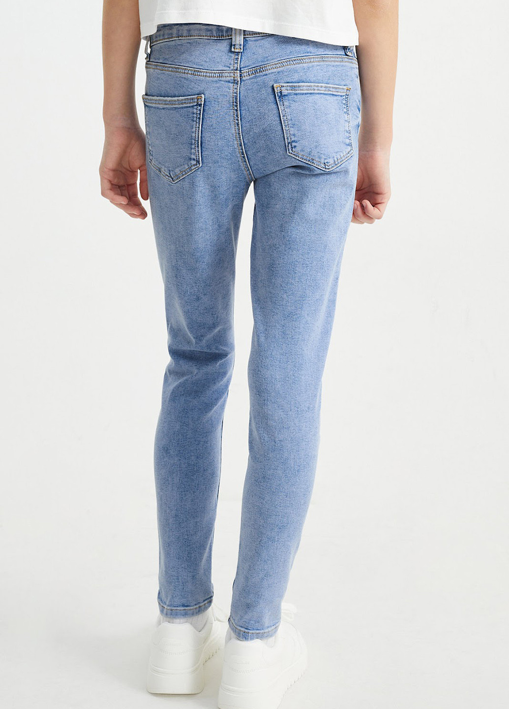 Голубые демисезонные зауженные джинсы C&A