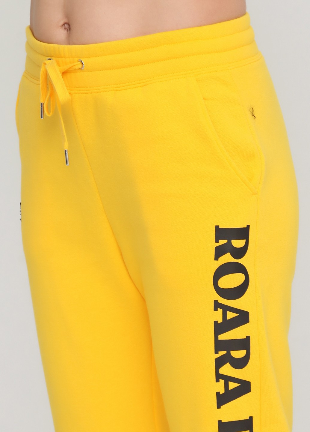 Желтые демисезонные брюки H&M