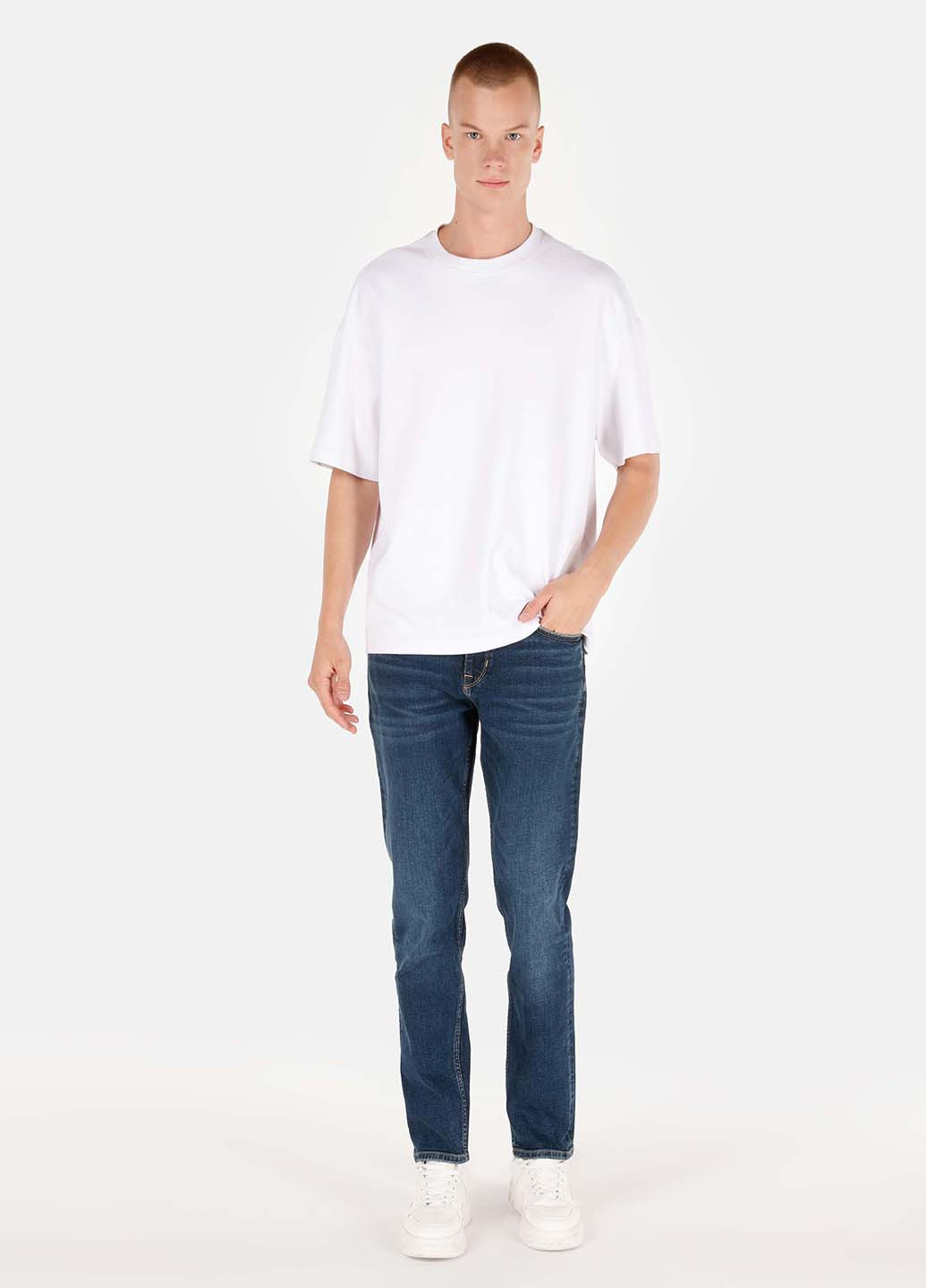 Темно-синие демисезонные зауженные джинсы Colin's