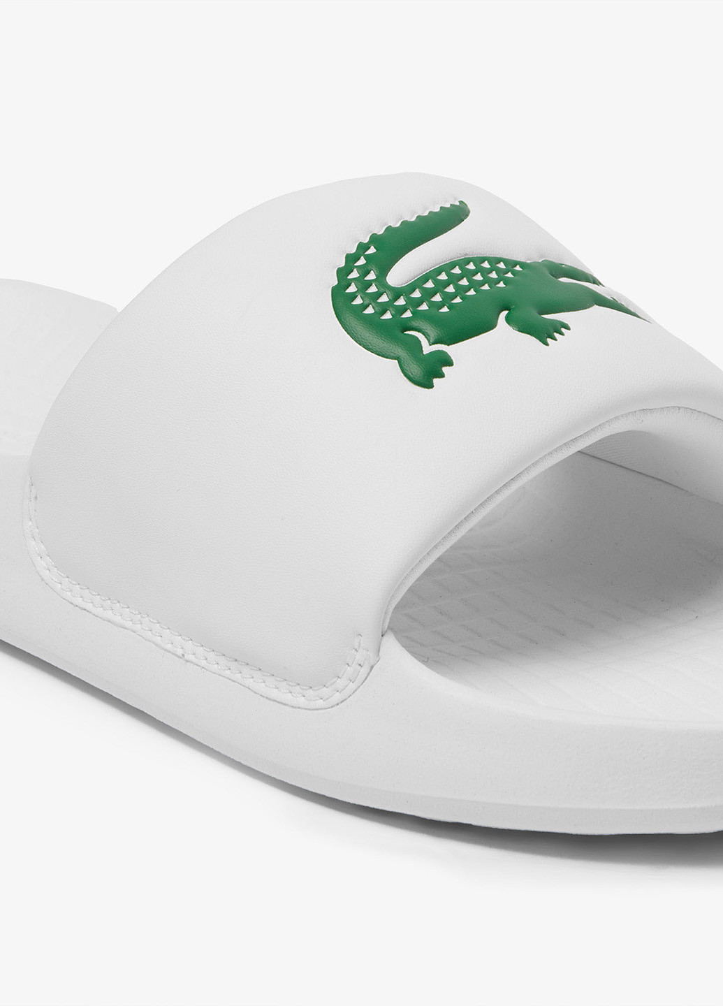 Белые спортивные шлепанцы Lacoste