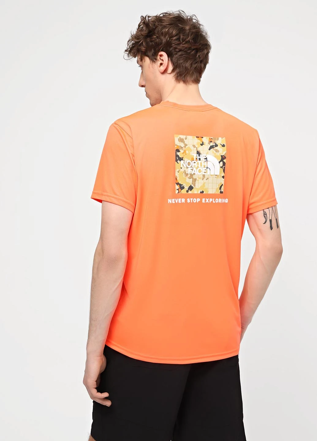 Оранжевая футболка The North Face