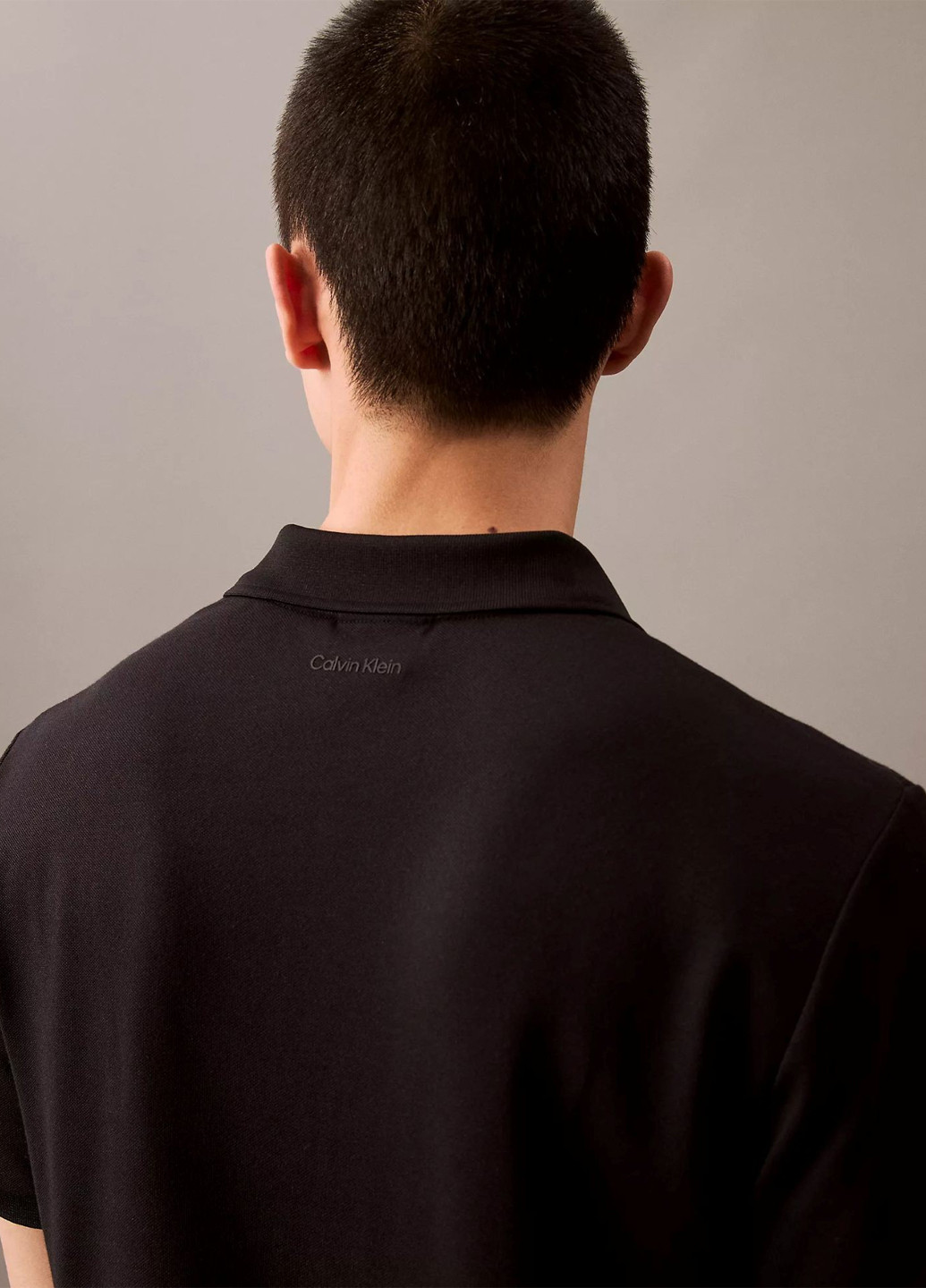 Черная футболка-поло для мужчин Calvin Klein однотонная
