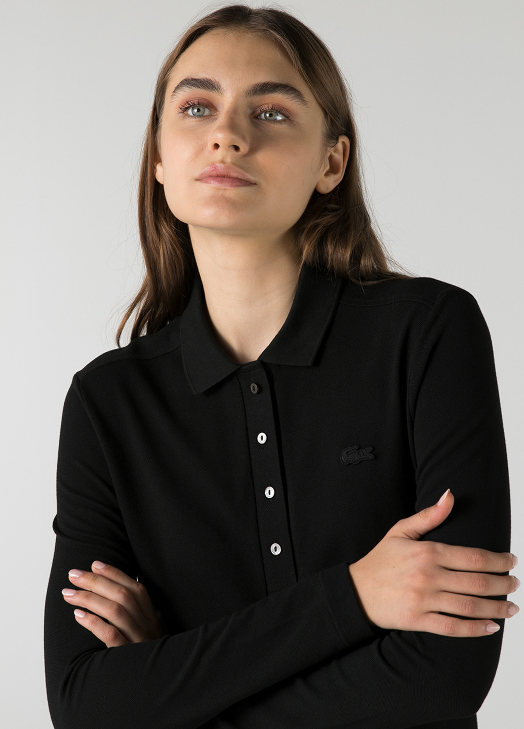 Черная женская футболка-поло Lacoste однотонная