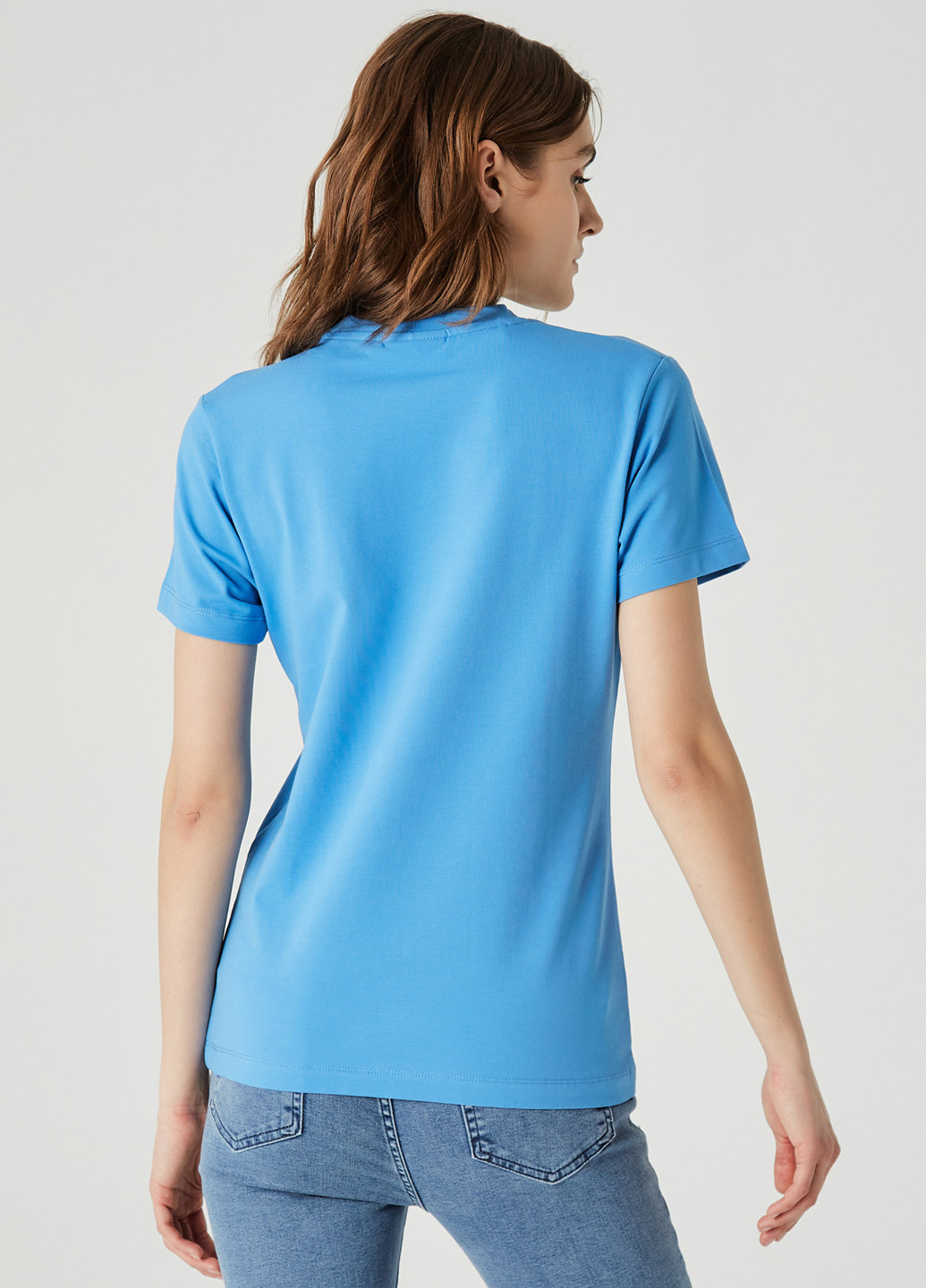 Темно-голубая всесезон футболка Lacoste