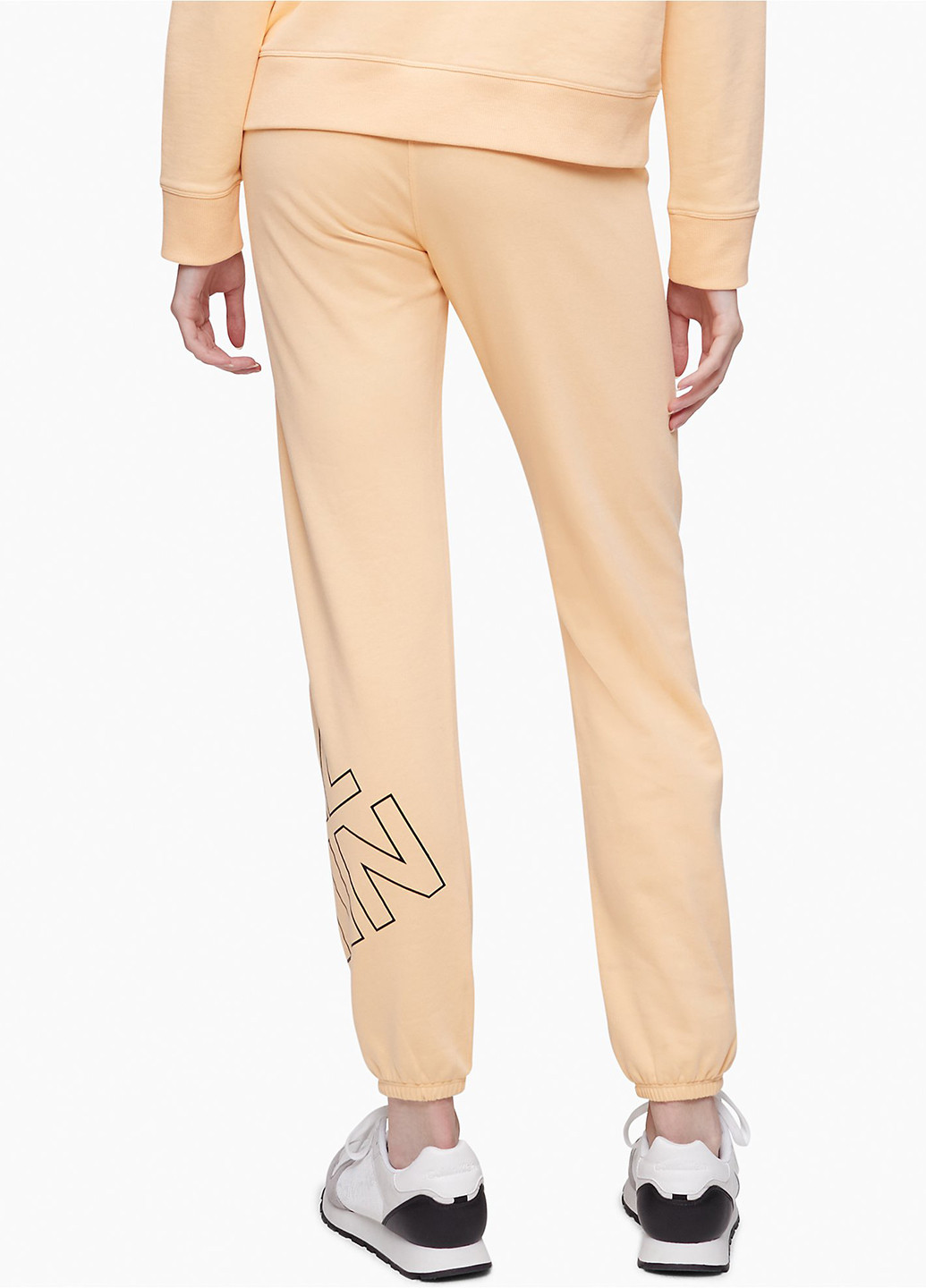Светло-бежевые спортивные демисезонные зауженные брюки Calvin Klein