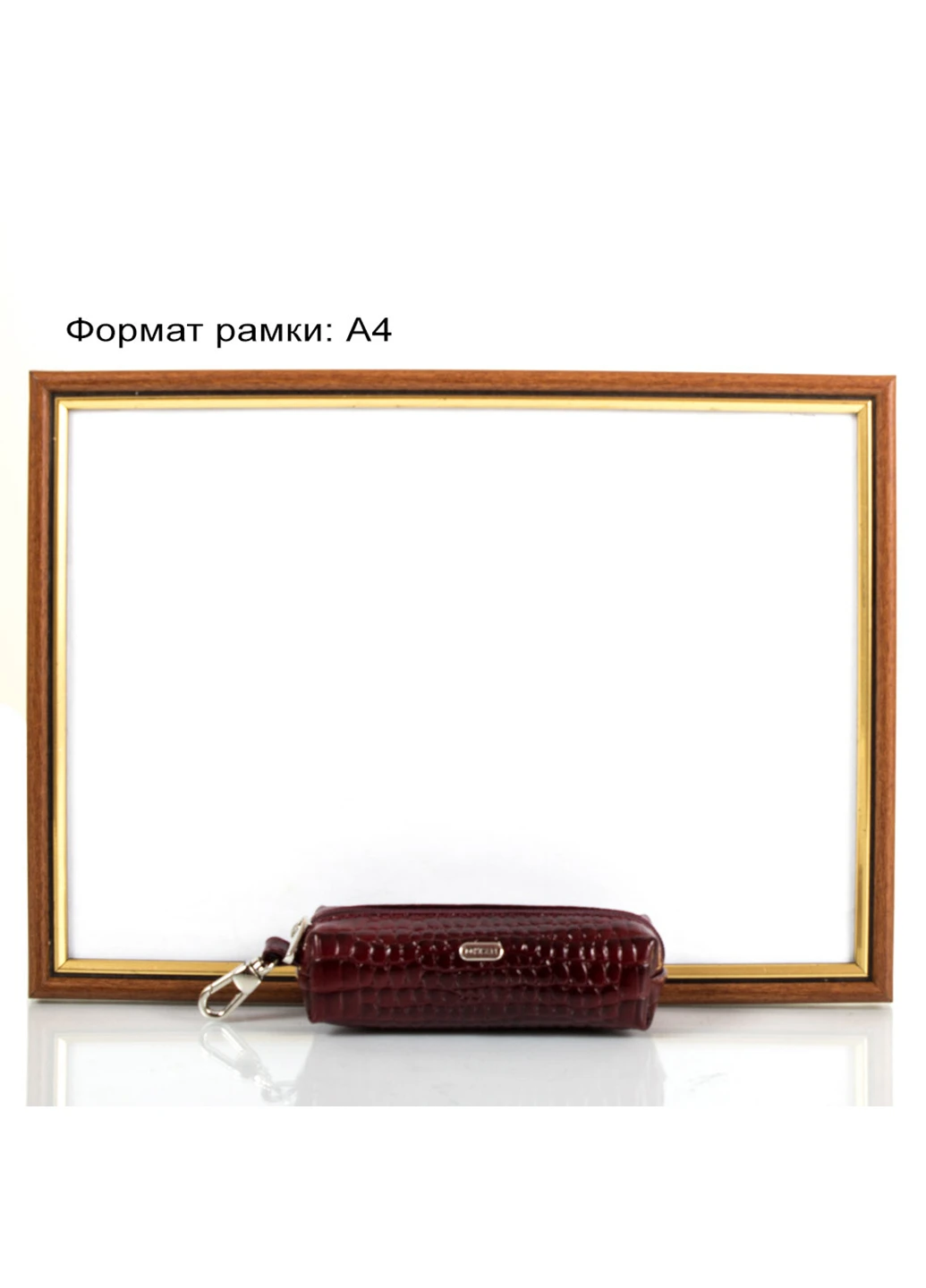 Жіноча шкіряна ключниця 12х3,5х4,5 см Desisan (255710035)