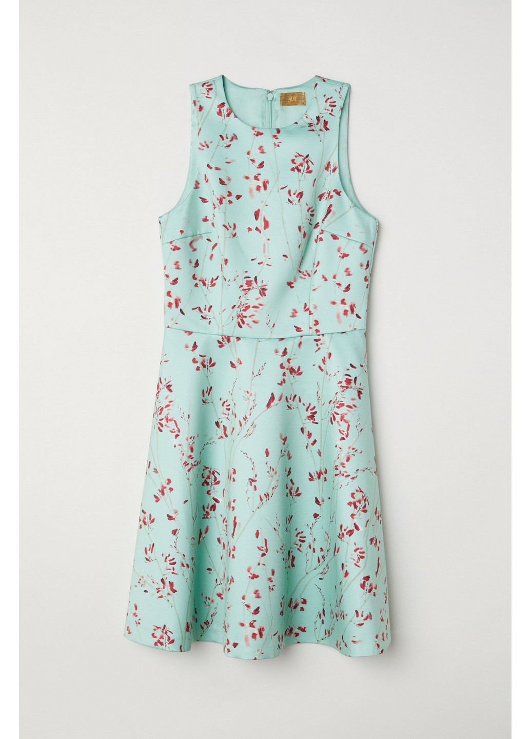 Бірюзова коктейльна сукня H&M з малюнком