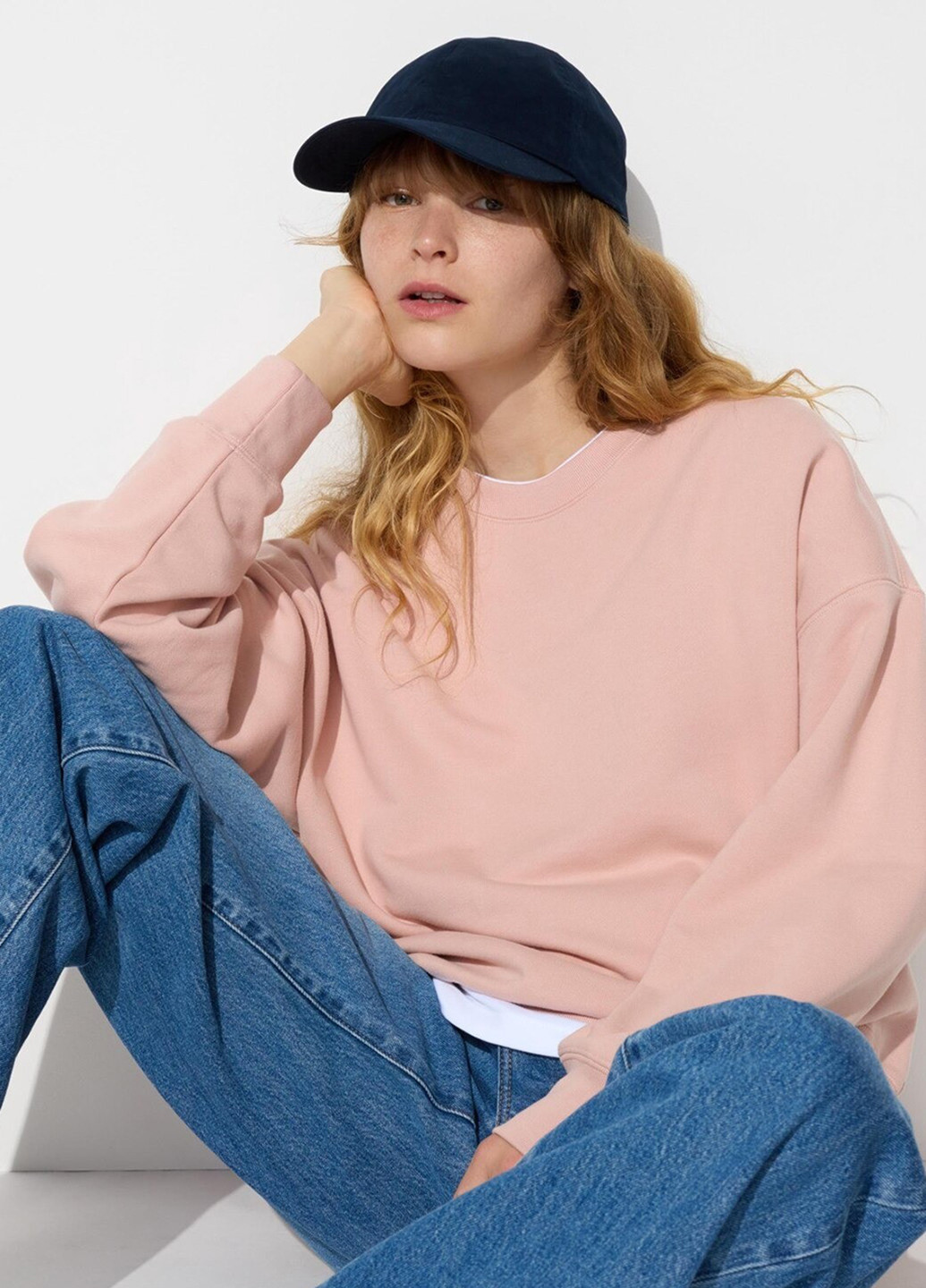 Світло-рожевий світшот Uniqlo однотонний без декору (320668692)