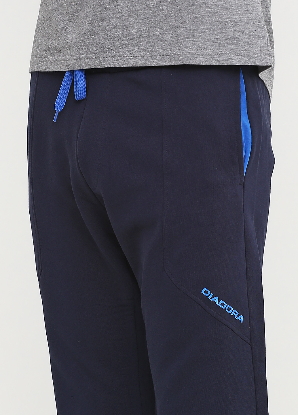 Темно-синие спортивные демисезонные зауженные брюки Diadora