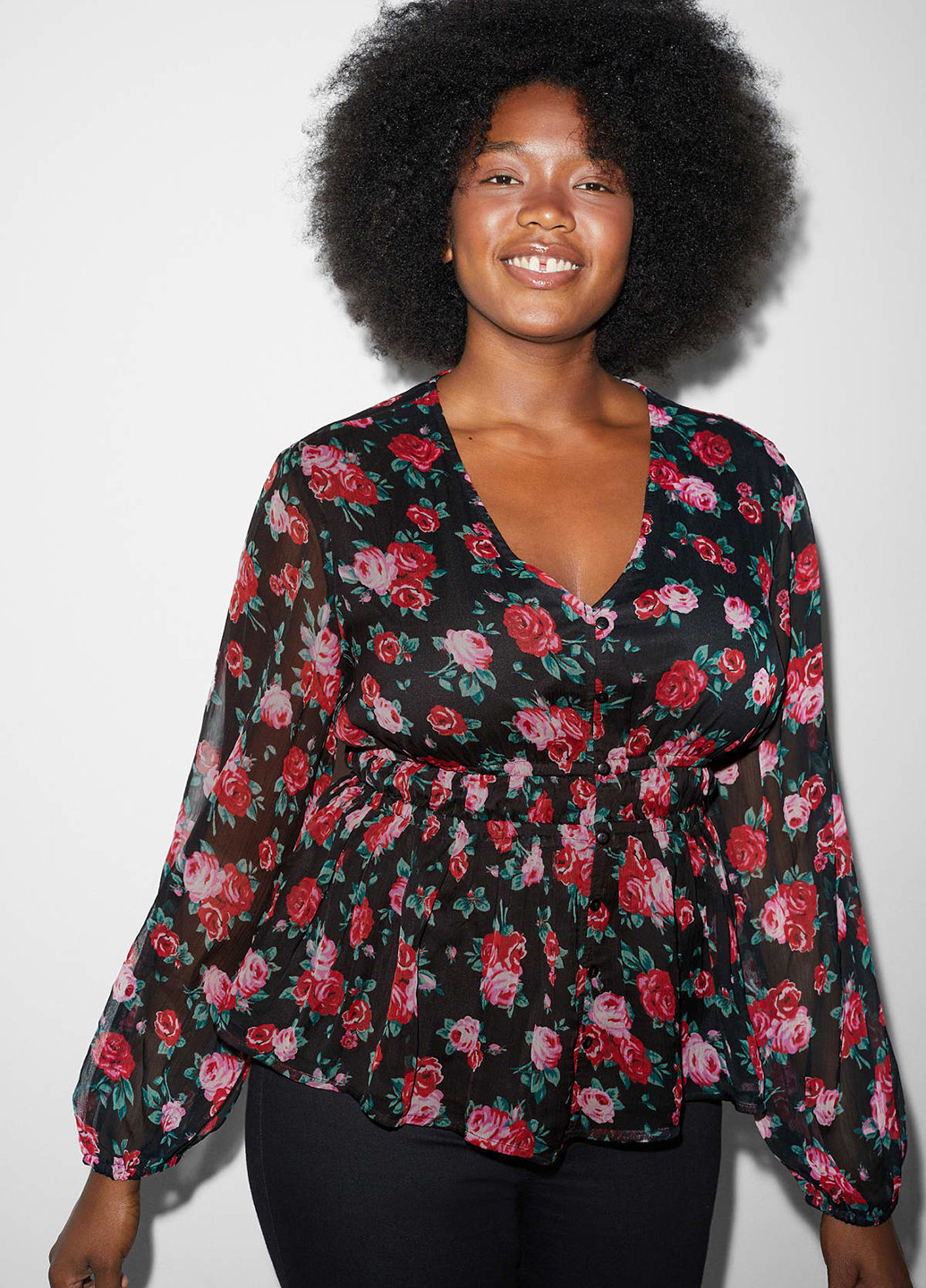 Чорна блуза з баскою C&A