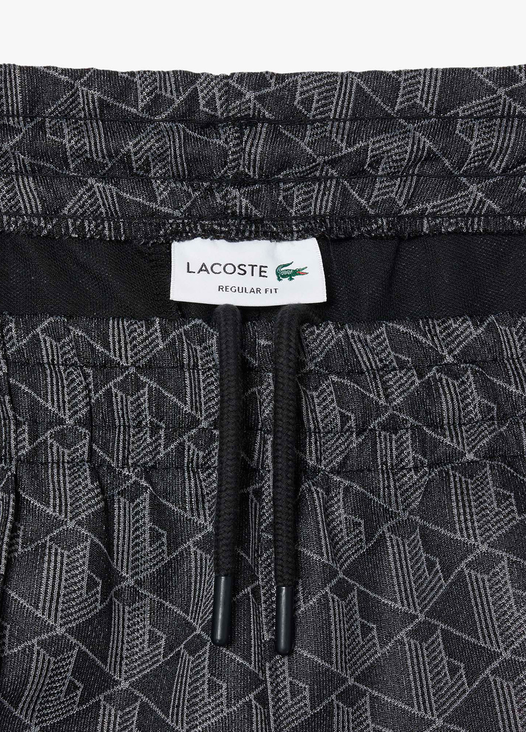 Темно-серые спортивные демисезонные зауженные брюки Lacoste