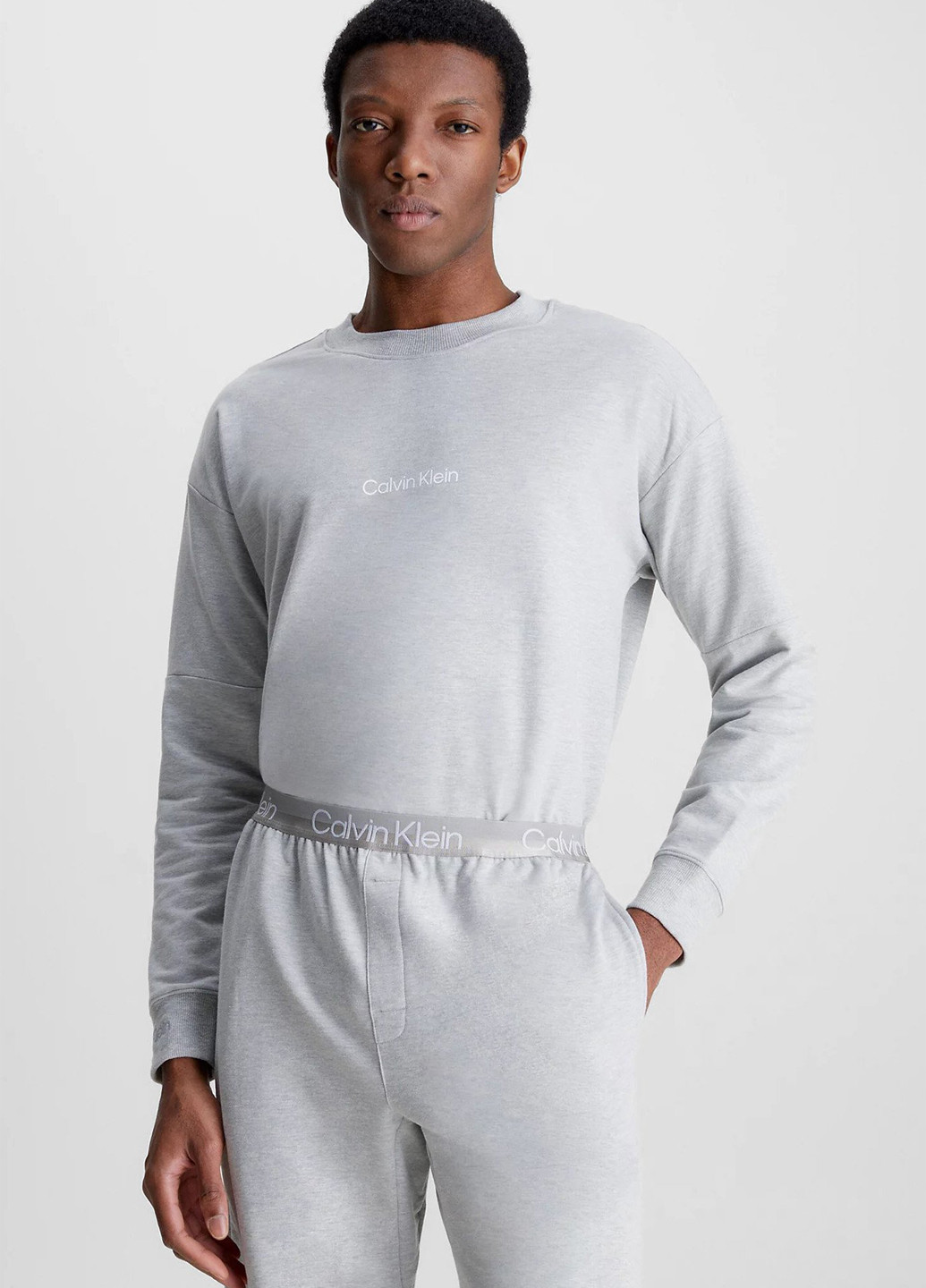 Серый свитшот Calvin Klein меланж без декора (328209639)