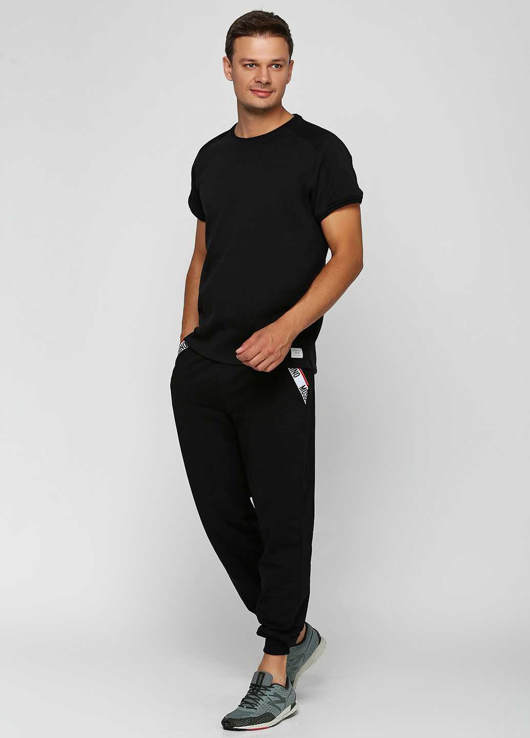 Черные спортивные демисезонные зауженные брюки Moschino