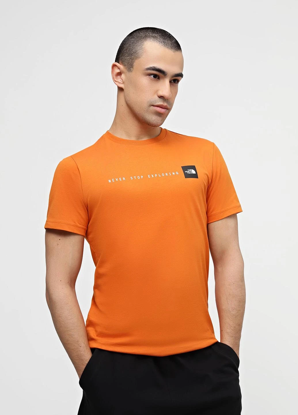 Помаранчева футболка The North Face
