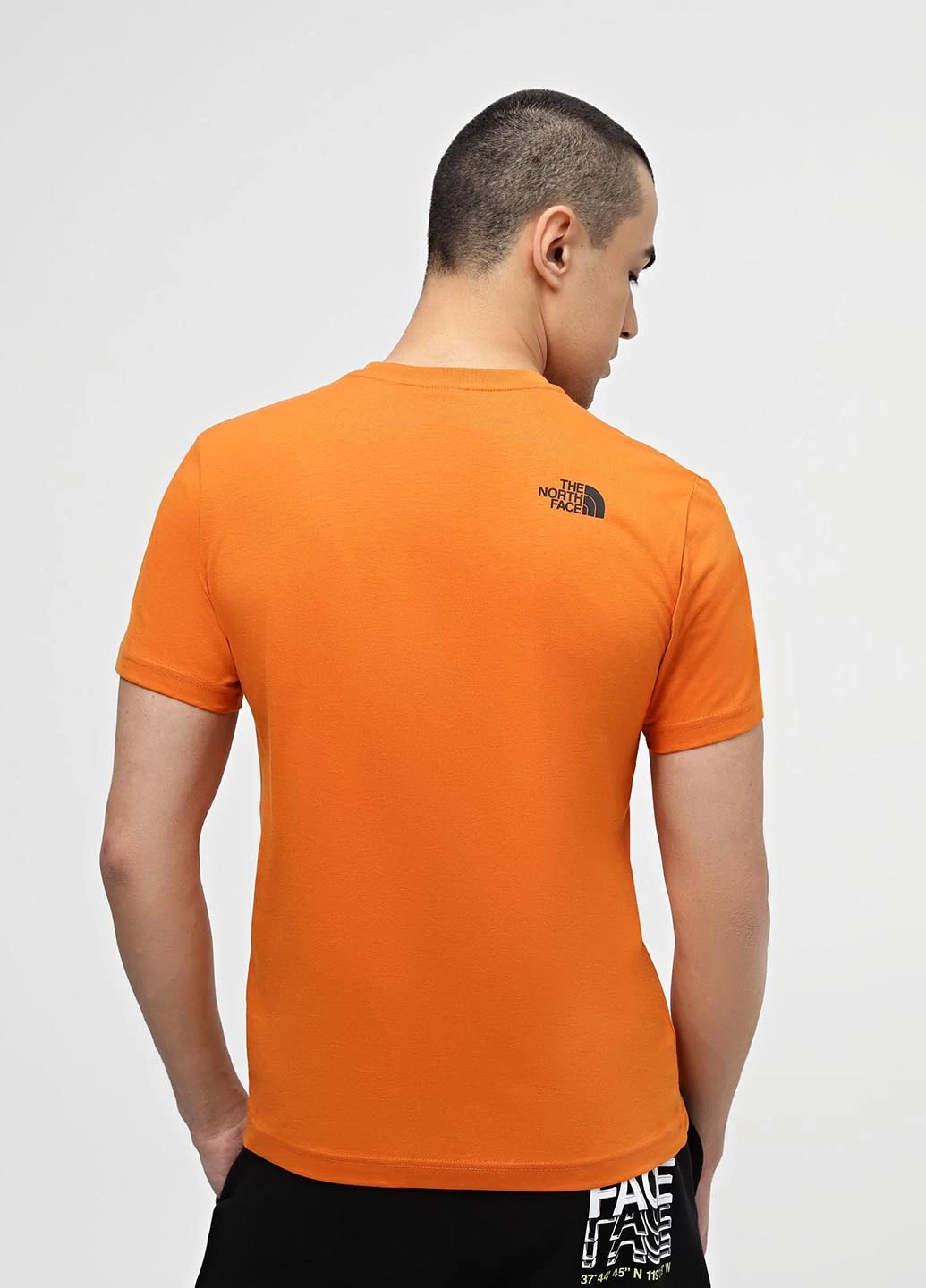 Помаранчева футболка The North Face