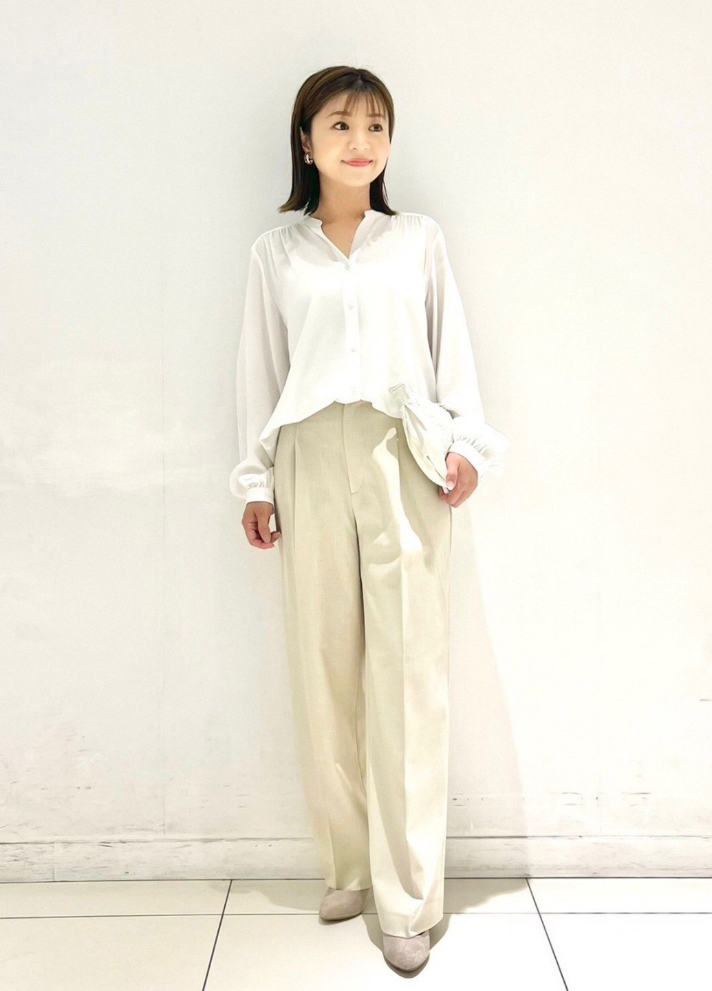 Біла блузка Uniqlo