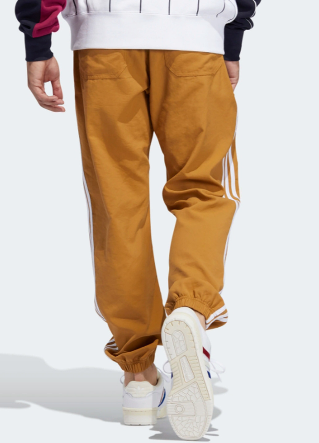 Горчичные спортивные демисезонные зауженные брюки adidas
