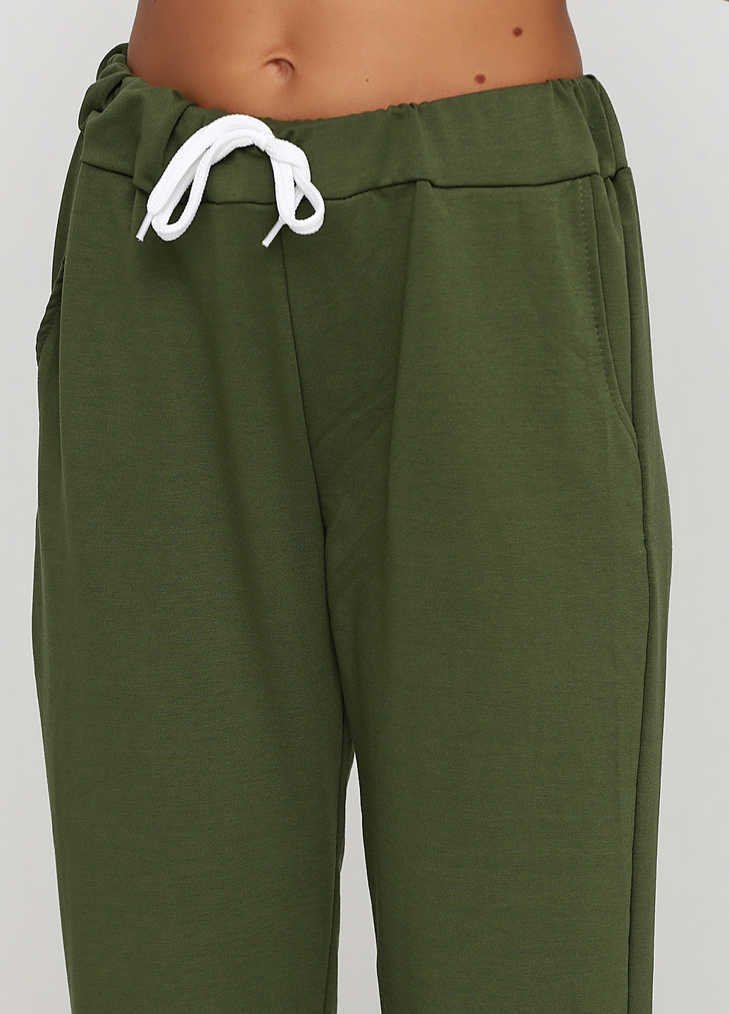 Зеленые спортивные демисезонные зауженные брюки Defile