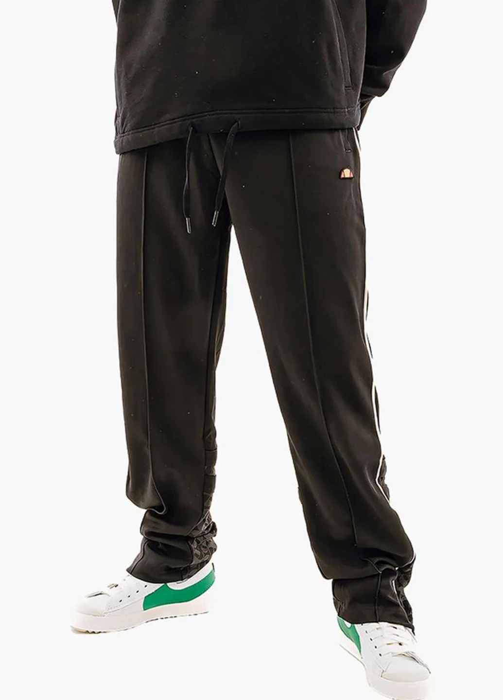 Черные спортивные демисезонные зауженные брюки Ellesse