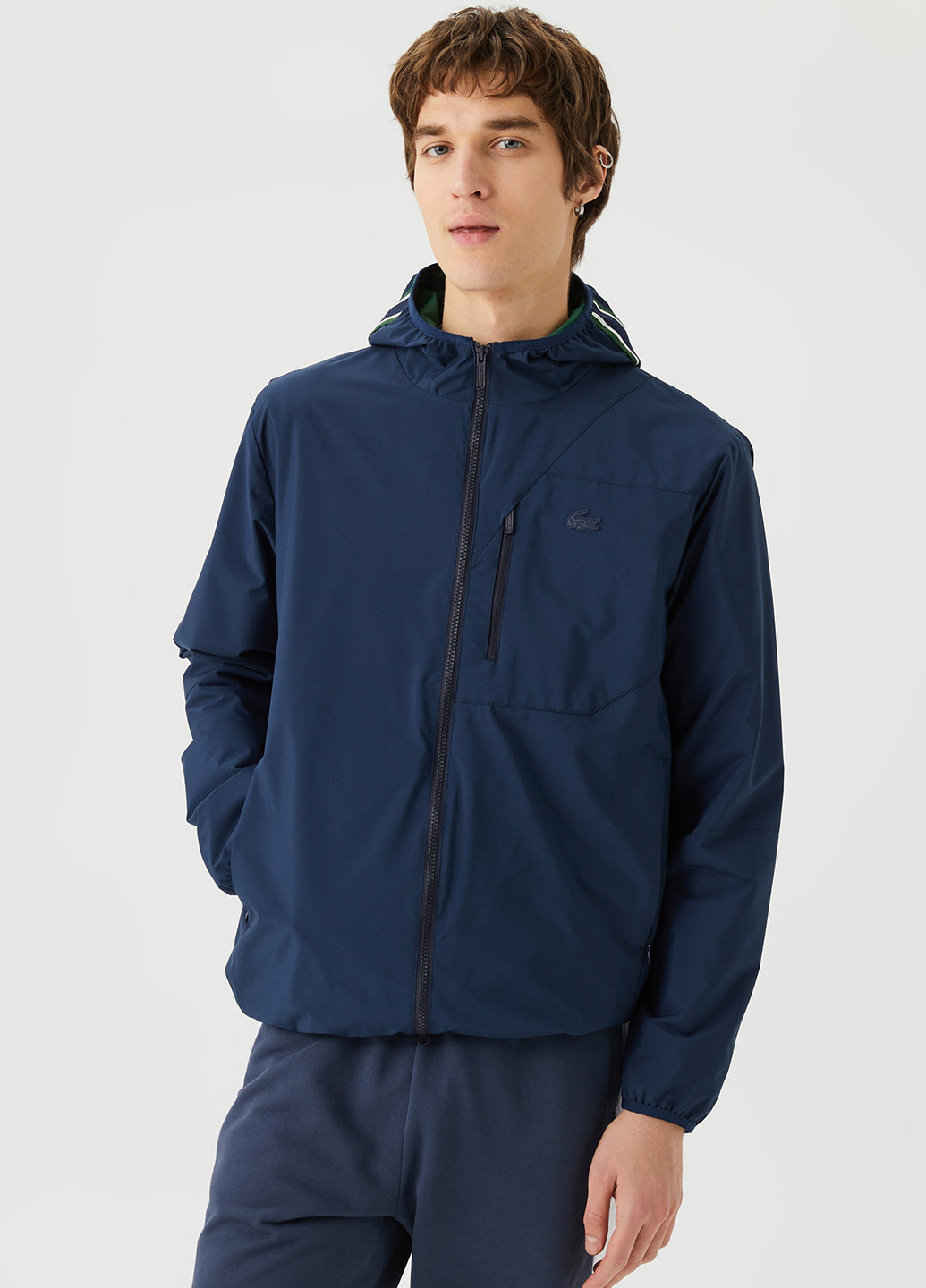 Темно-синяя демисезонная куртка Lacoste