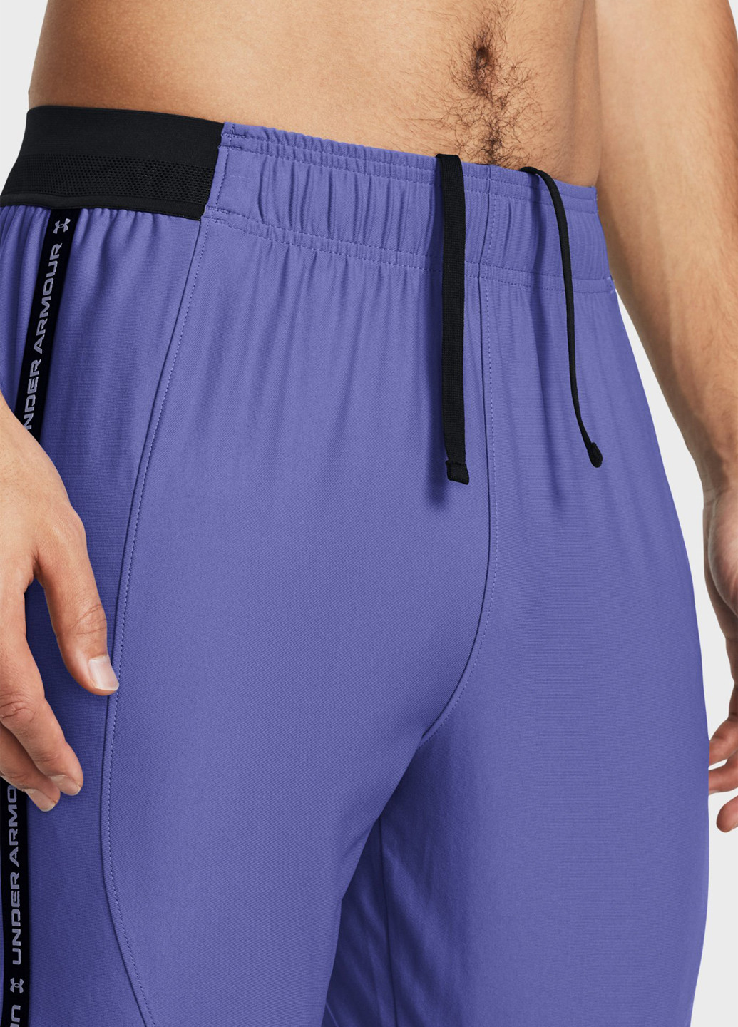 Синие спортивные демисезонные зауженные брюки Under Armour