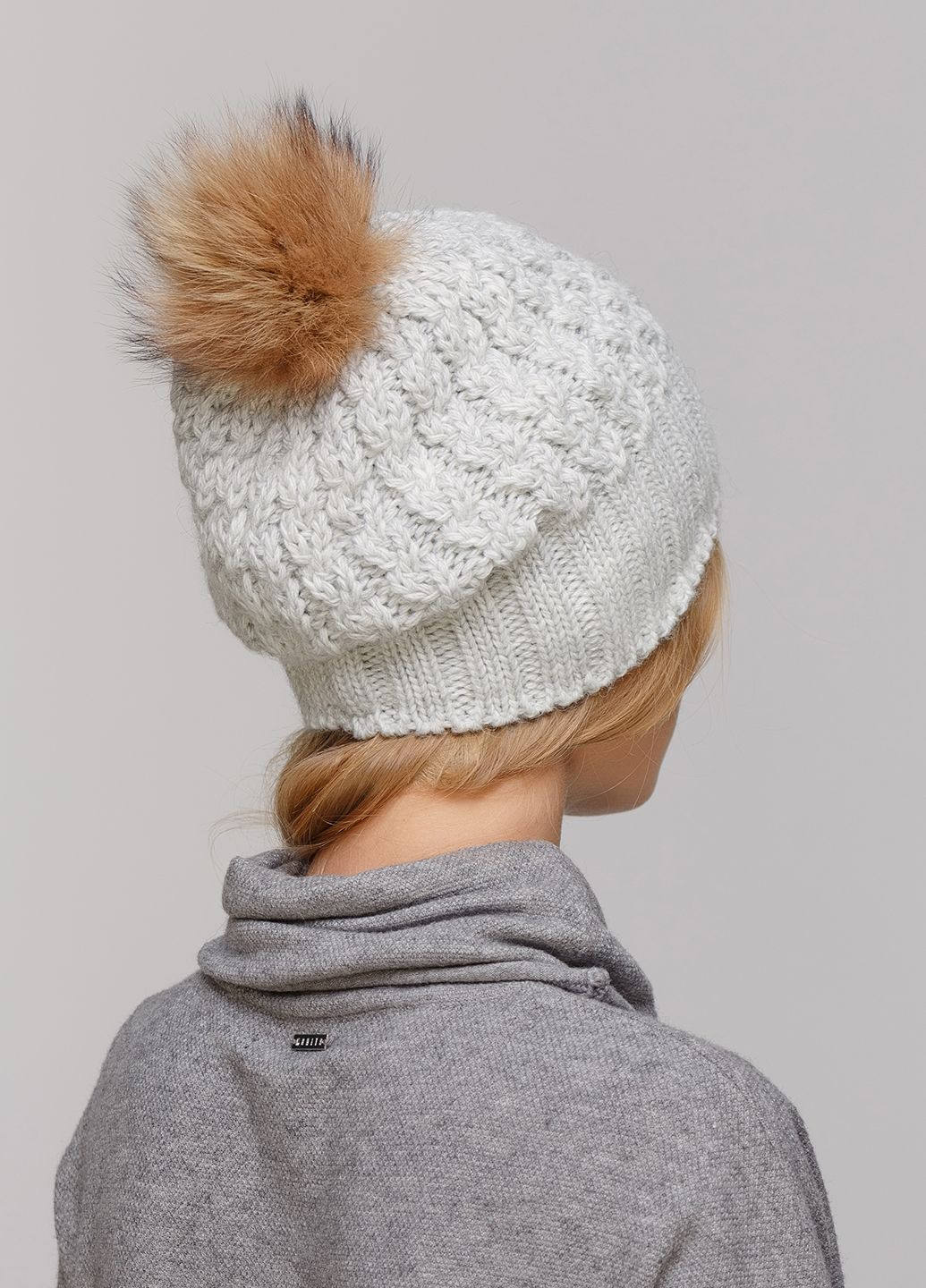 Зимняя теплая женская шапка на флисовой подкладке 550622 Merlini (249643395)