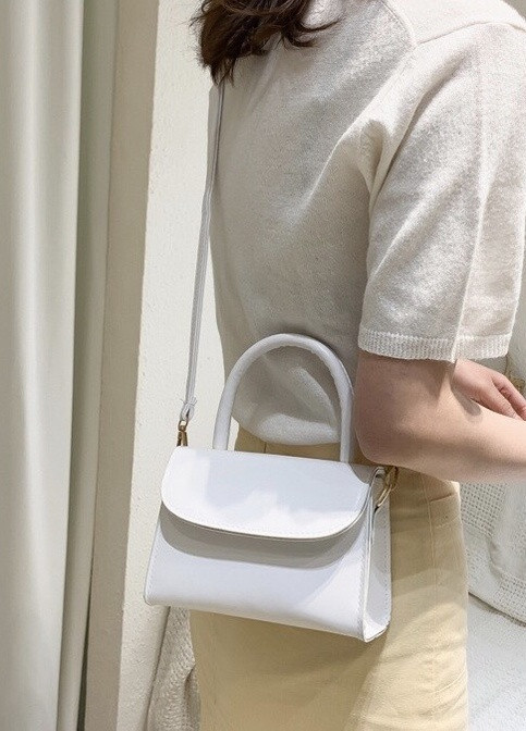 Жіноча класична маленька міні сумочка крос-боді на ремінці через плече біла NoName (251204082)