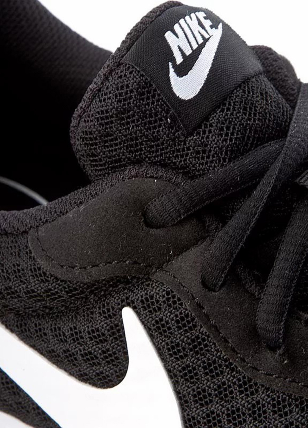 Чорні всесезон кросівки Nike Tanjun