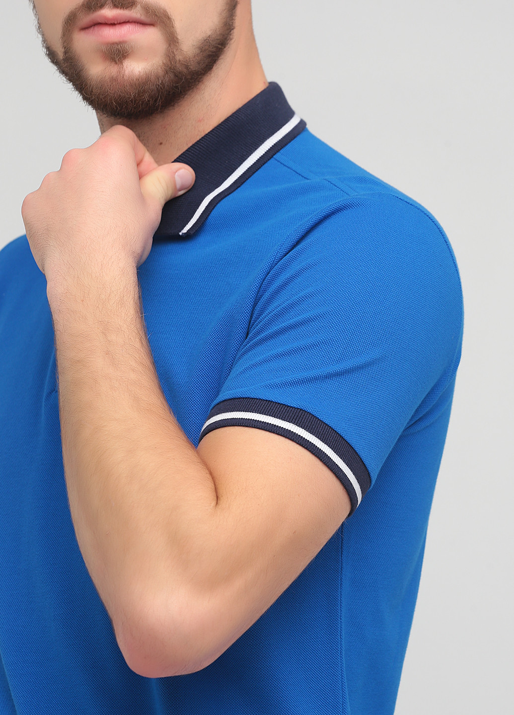 Светло-синяя футболка-поло для мужчин Ellesse однотонная