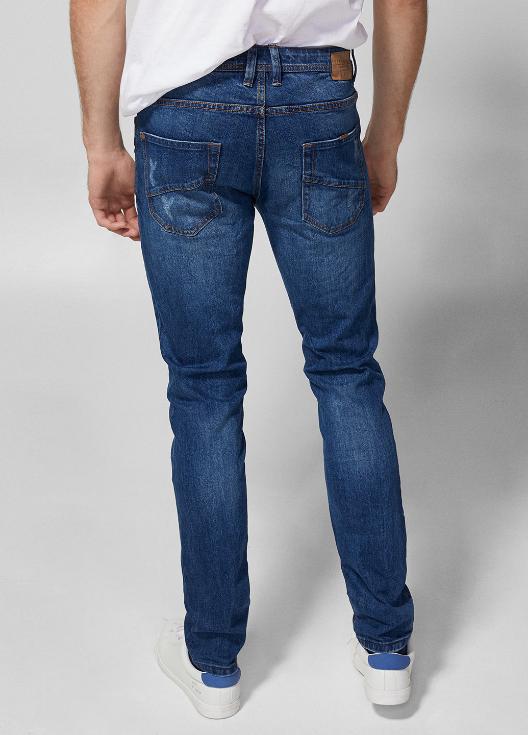 Синие демисезонные зауженные джинсы Springfield
