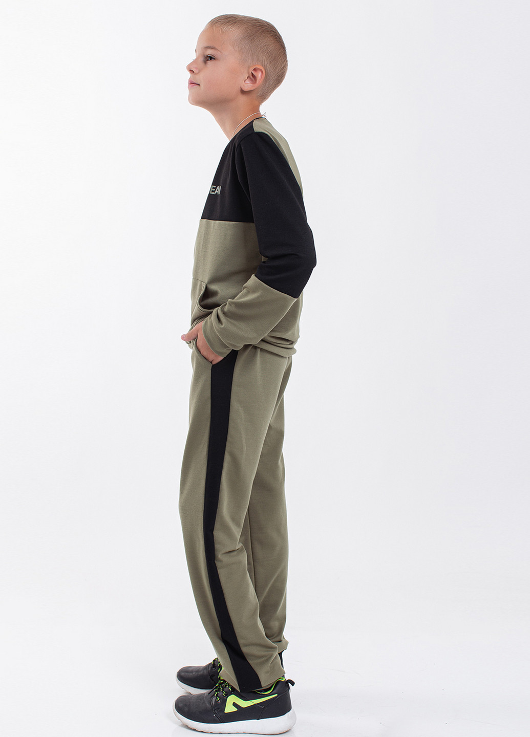 Оливковий демісезонний костюм (світшот, брюки) брючний Modna Anka