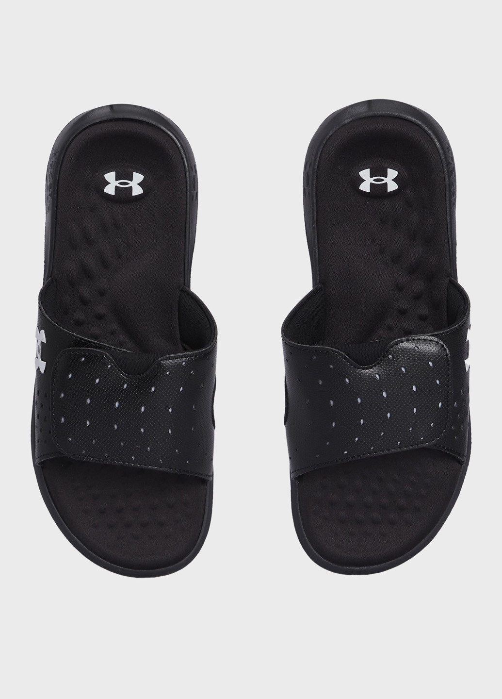 Черные шлепанцы Under Armour с перфорацией