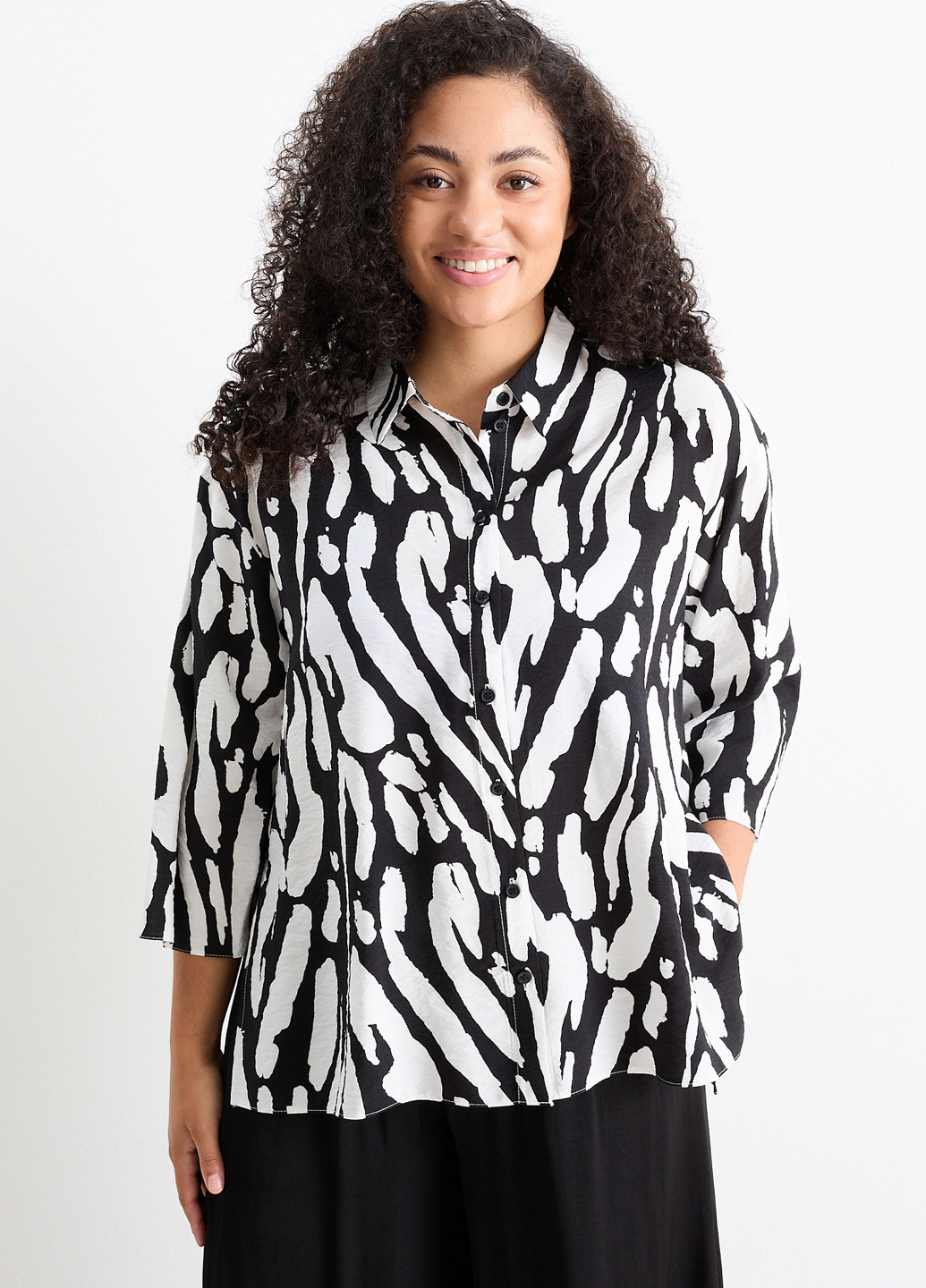 Чорно-біла блуза C&A