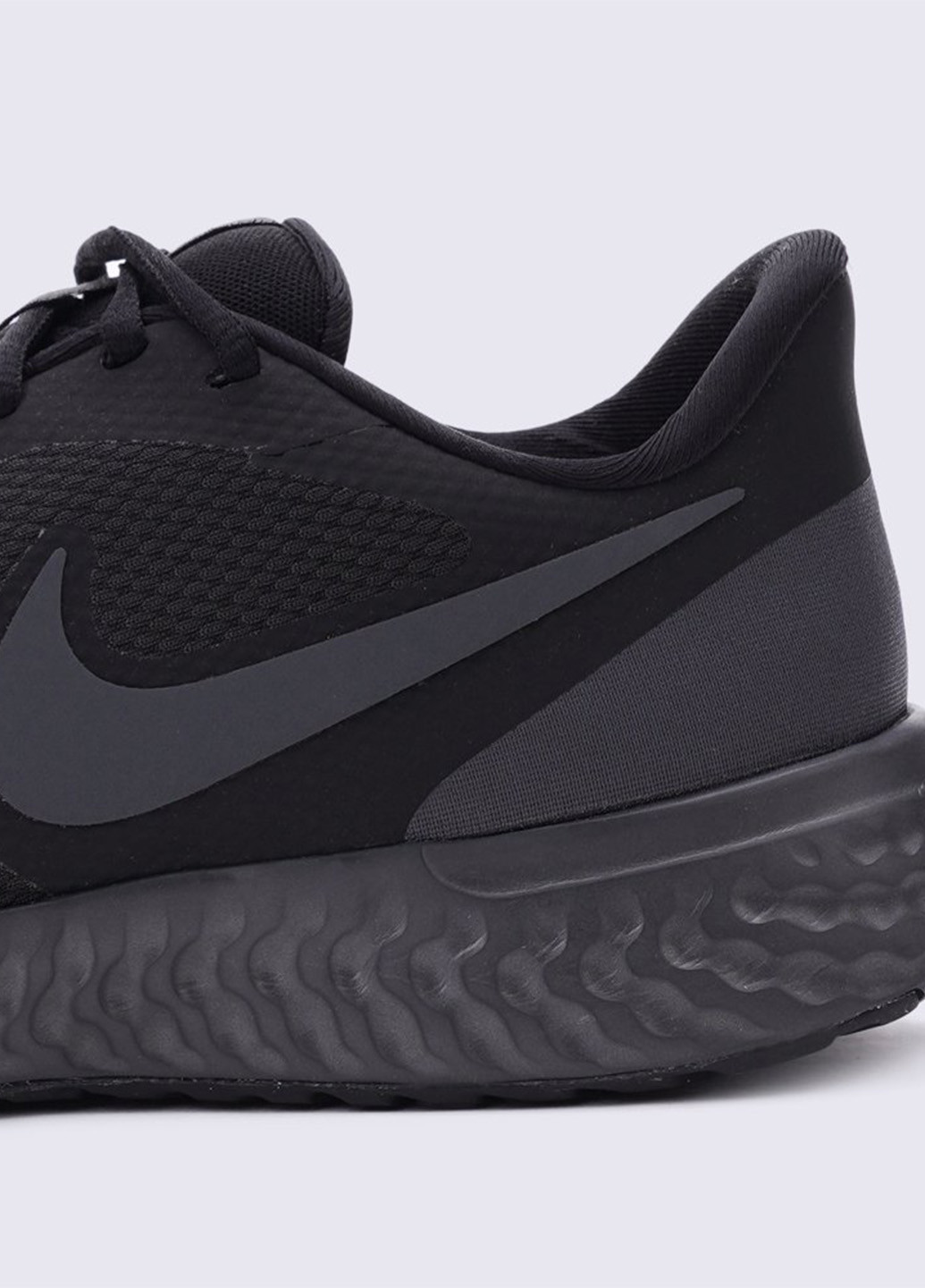 Чорні всесезон кросівки Nike Revolution 5