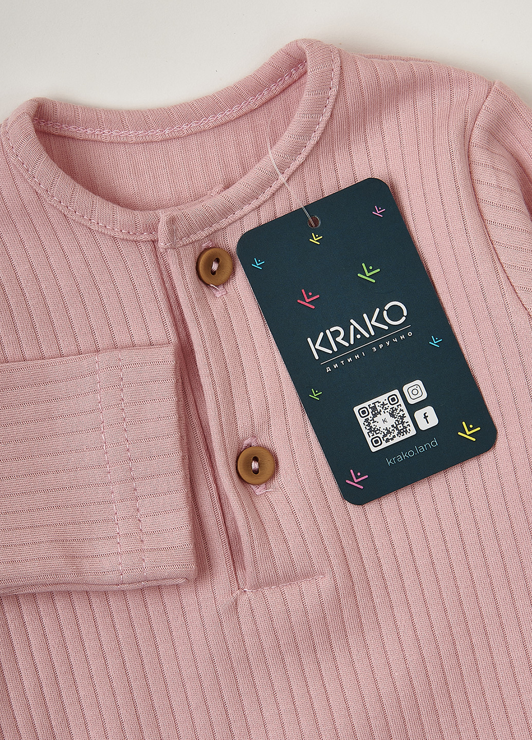 Розовый демисезонный комплект (боди, брюки) KRAKO