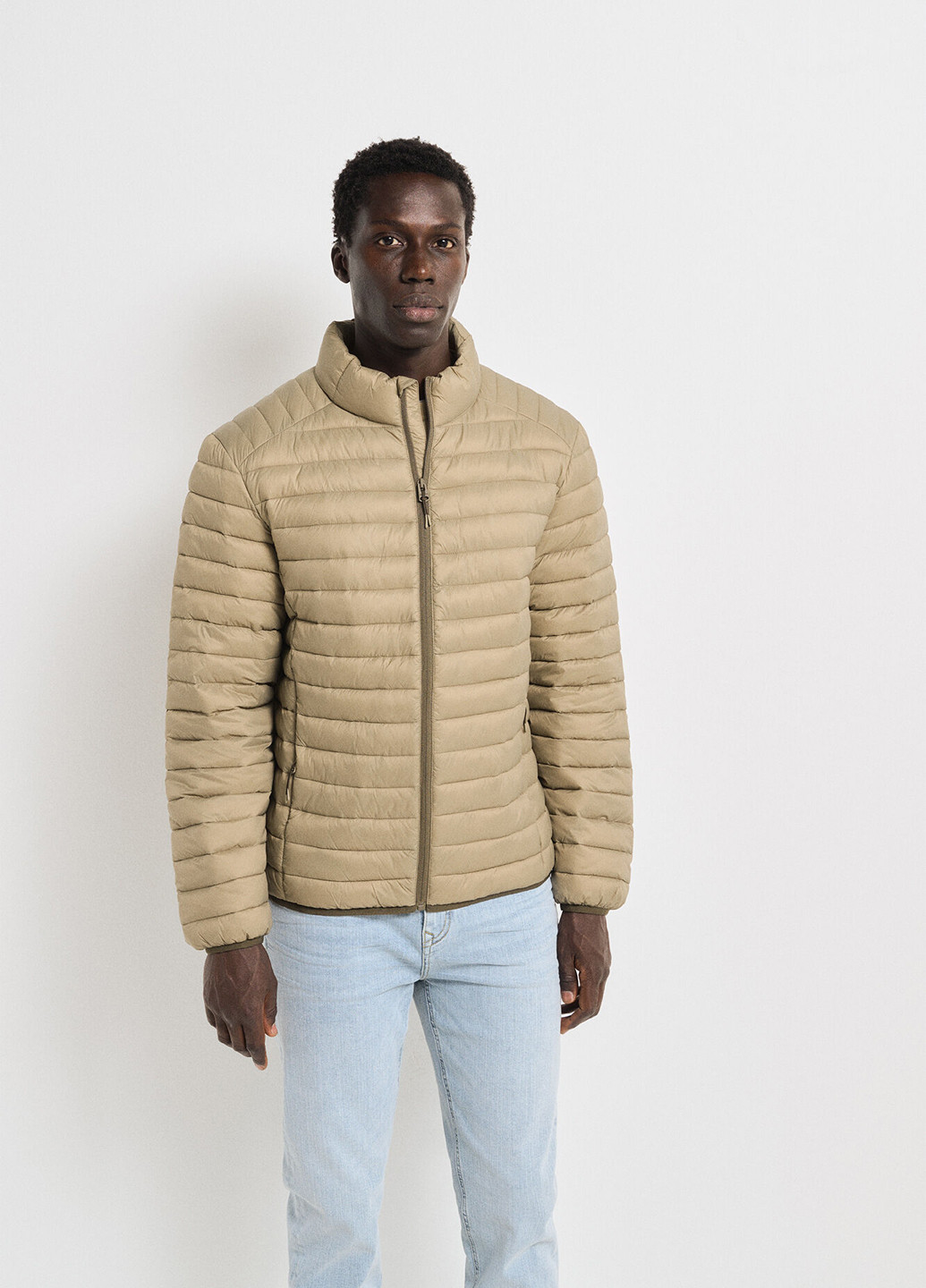 Бежева демісезонна куртка Springfield