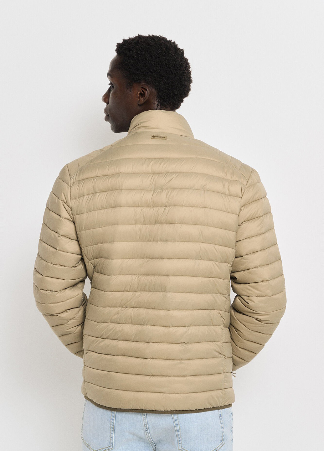 Бежева демісезонна куртка Springfield